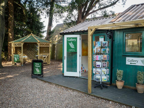 Guest Artists exhibit in the Yew Trees Gazebo