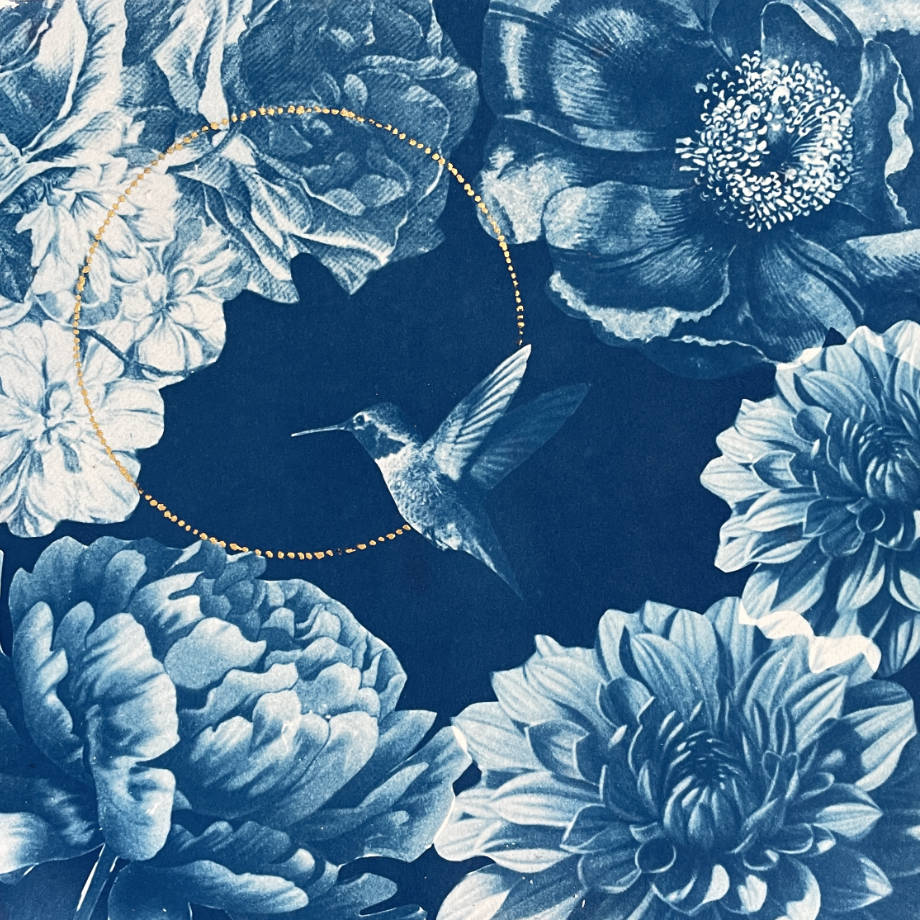 blue and white image of a hummingbird with a gold circle surrounded by flowers