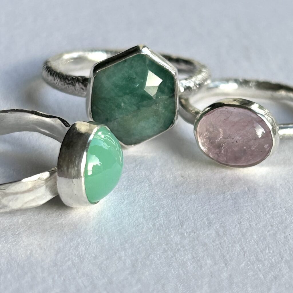 Three sterling silver gemstone rings