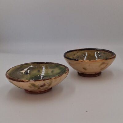 Claire Pritchard - Small green dishes with slip trailed decoration