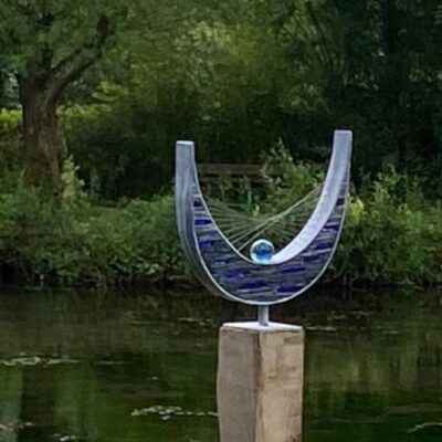 Paul Burton - A Cobalt Stringed Portal installed on a Mill Pond