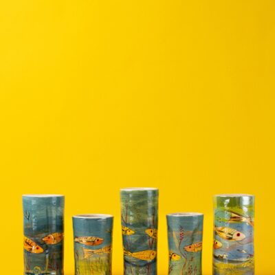 Earls Croome Pottery - vases and beakers on yellow