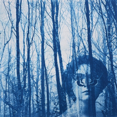 Anne Guest - butterfly on a womans face