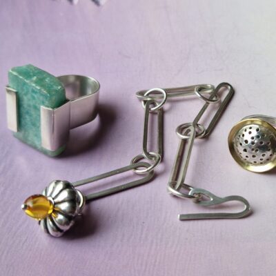 Julia Mathias Silver link bracelet with amber. Silver and amazonite ring. Silver domed and pierced ring.
