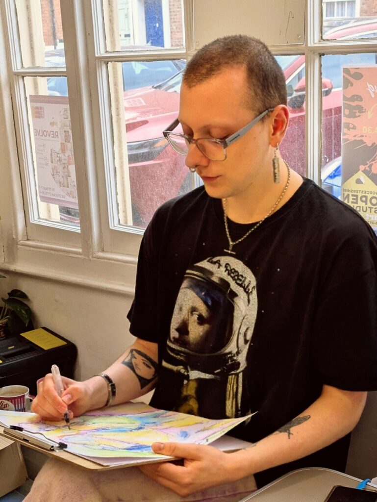 Artist drawing live.