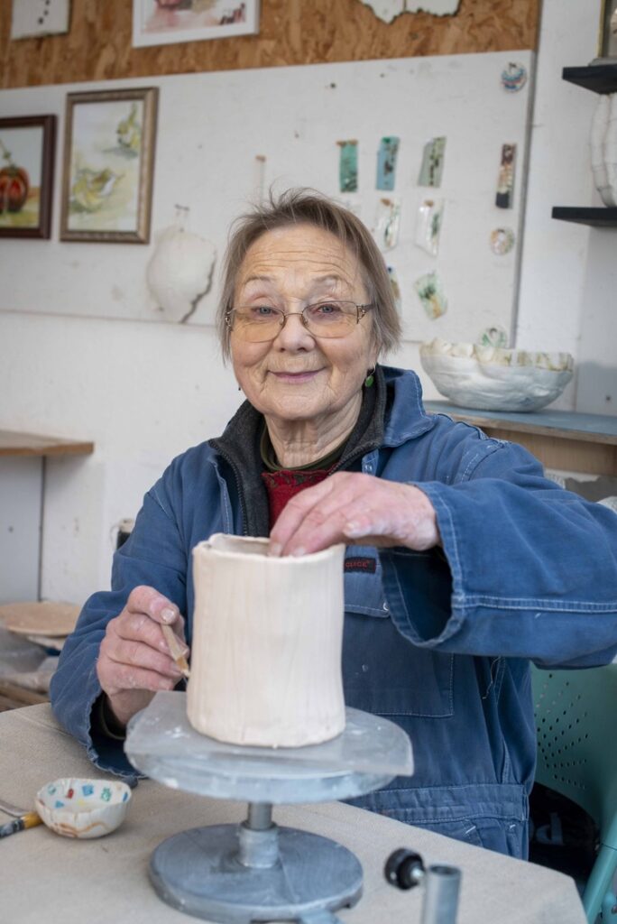 Gabi Rucinski working on a pot