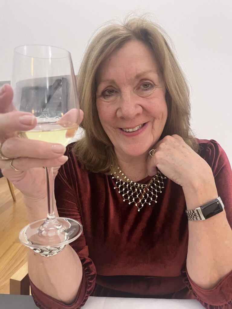 Enjoying a glass of celebrating an exhibition