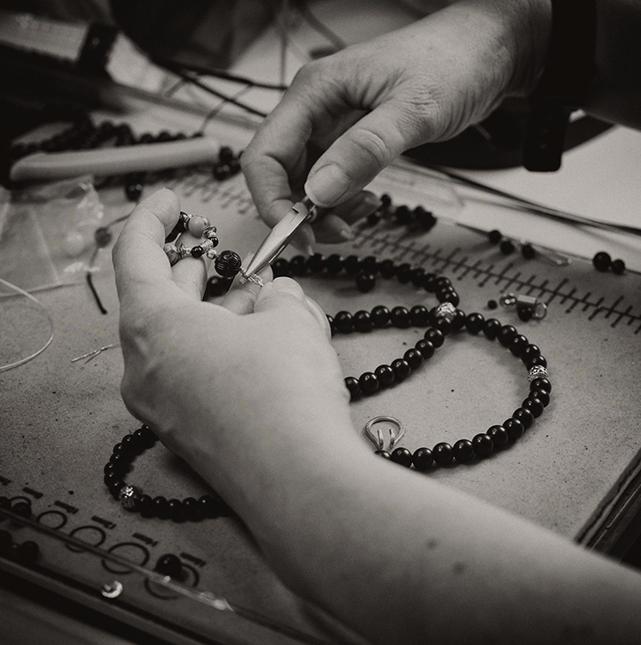 My hands at work creating a necklace