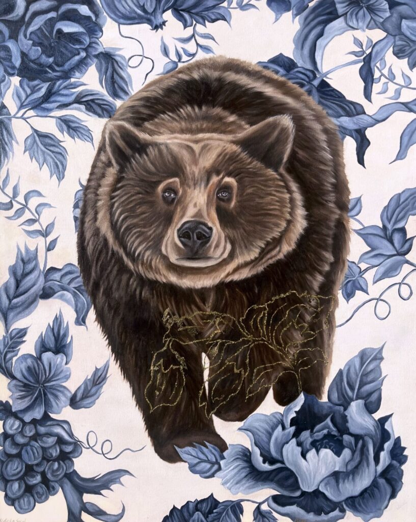 Oil painting of a brown bear walking forward, centrally positioned against a pale background filled with intricate blue floral patterns. The bear is painted realistically with layered brushstrokes, while delicate gold leaf botanical details are applied across the surface, combining wildlife imagery with decorative pattern and luminous metallic texture.