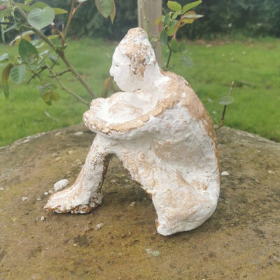 Artwork by Andrea Richardson: Painted ceramic figure. 'A moment's peace'